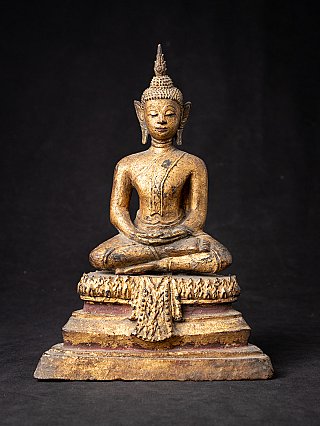 Antique Thai wooden Buddha statue seated in dhyana mudra, full front view