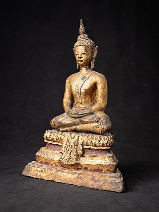 Antique wooden Thai Buddha statue