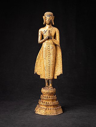 Thai bronze monk statue standing with hands in namaskara mudra, full front