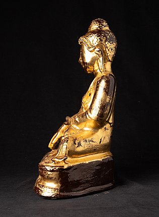 Bronze Buddha statue from Burma, left side profile with tiered base