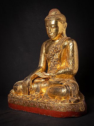Grosse alte holzerne Mandalay Buddha