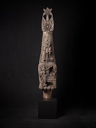 Wooden temple panel from Myanmar on stand, full-front view with relief carving