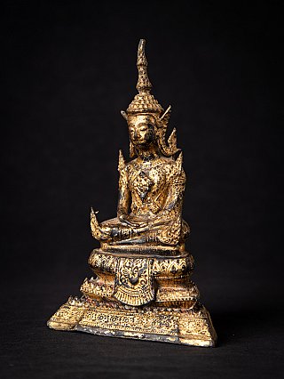 Thai bronze Buddha statue seated in dhyana mudra, three-quarter left view
