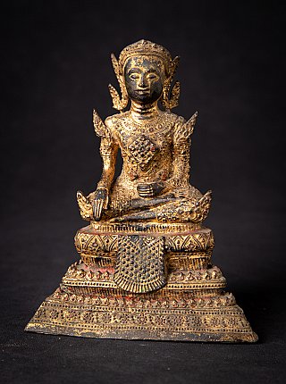 Thai bronze Buddha statue seated in bhumisparsha mudra, full front on tiered base
