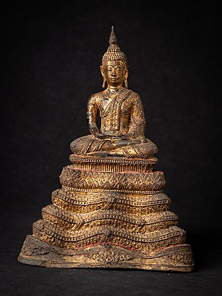 Thai bronze Buddha statue seated in dhyana mudra on a tiered base, full-front