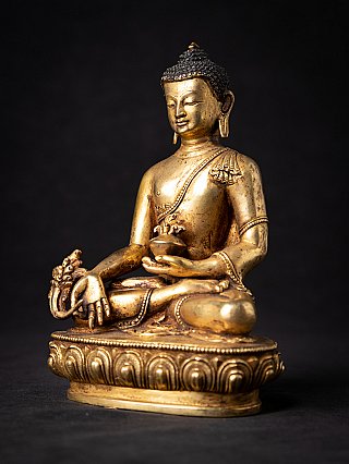 Bronze-Medizin-Buddha-Statue aus Nepal mit Schale in der Hand, Dreiviertelansicht rechts