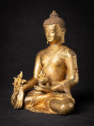 Medizin-Buddha-Statue aus Nepal in Bronze, Dreiviertelansicht mit Schale und Armschmuck