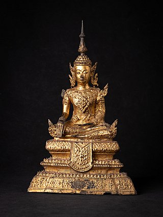 Thai bronze Buddha statue seated in bhumisparsha mudra on tiered base, full front view