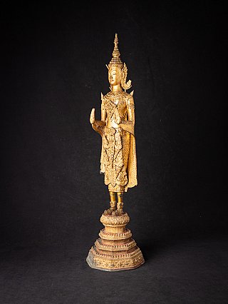 Thai bronze Buddha statue, three-quarter left view showing Abhaya mudra gesture