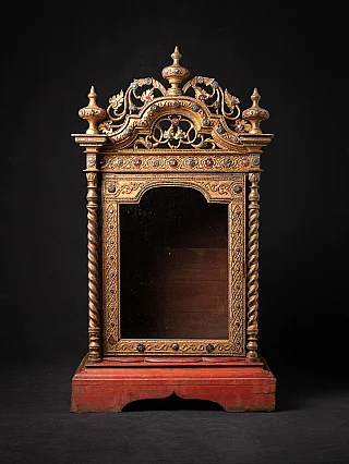 Antique wooden Burmese temple shrine, Mandalay period, front view with glass door