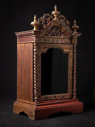 Wooden Burmese temple shrine, Mandalay period, three-quarter view showing left side