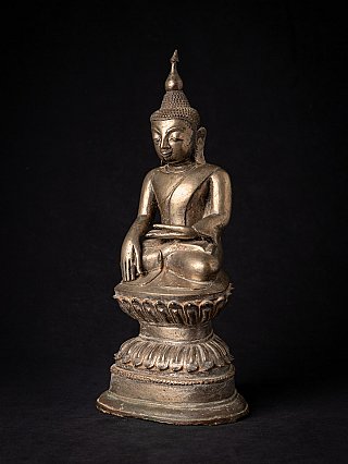 Bronze Burmese Buddha statue in Ava style on lotus base, three-quarter right view
