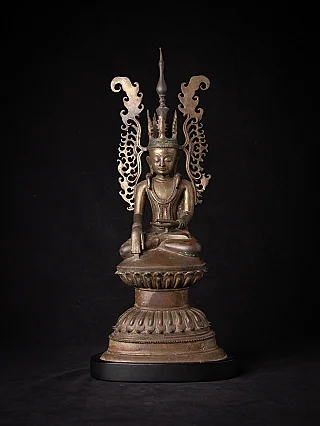 Crowned Buddha statue in bronze from Burma, seated on lotus base with openwork aureole, front view