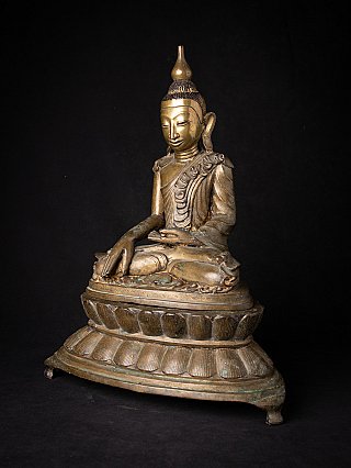 Bronze Shan Buddha statue from Burma shown in three-quarter view, seated with bhumisparsha gesture