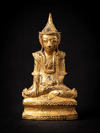 Burmese Shan Buddha statue in wood, seated in bhumisparsha mudra, full front view