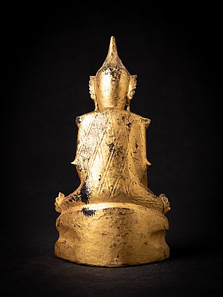 Antique Burmese Shan Buddha statue in wood, rear view showing worn gilding