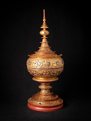 Burmese gilded wooden offering vessel, three-quarter view with red-lacquered base