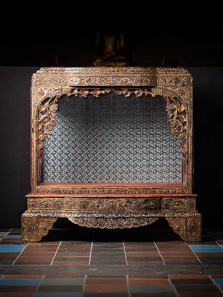 Antique Burmese wooden temple shrine with gilded front opening and mirrored back panel
