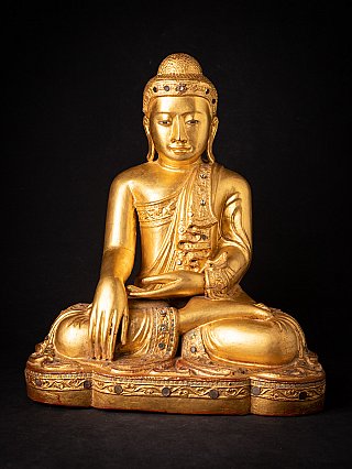 Burmese Mandalay Buddha statue in wood, seated in bhumisparsha mudra, full front view