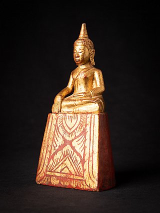 Antique wooden Thai Buddha statue