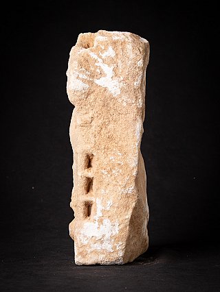 Antique Indian marble statue, side view with rough surface and rectangular cut-outs