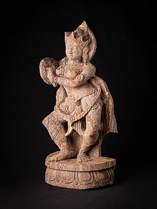 Old sandstone Indian Music lady