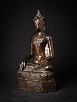 Bronze Buddha statue from Thailand, seated, three-quarter left view on lotus pedestal