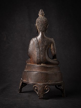 Lanna bronze Buddha statue from Thailand, rear view with robe strap across the back