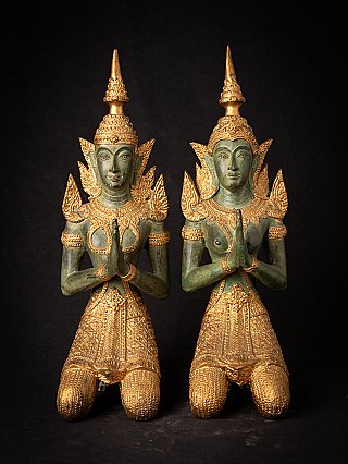 Pair of Thai bronze temple guard statues with tall crowns, straight-on front view