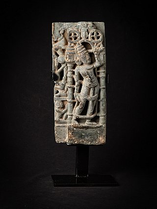 Indian temple relief panel with standing figure between pillars, full front view