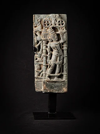 Indian temple relief panel with standing figure between pillars, full front view