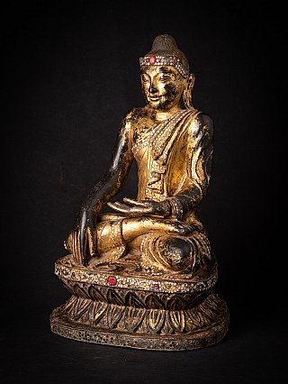 Burmese wooden Buddha statue, seated, three-quarter view showing inlaid base band