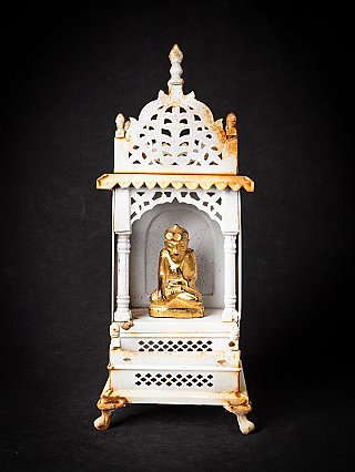 Buddha statue in a metal shrine from Nepal, full front view