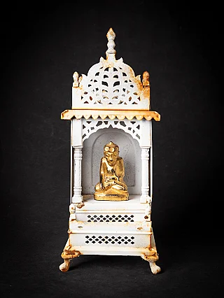 Buddha statue in a metal shrine from Nepal, full front view