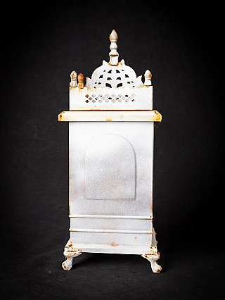 Rear view of the Nepalese metal shrine showing the arched panel