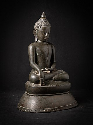 Burmese bronze Buddha statue seated in bhumisparsha mudra, three-quarter view