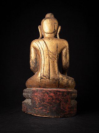 Burmese wooden Buddha statue, rear view showing red-lacquered base