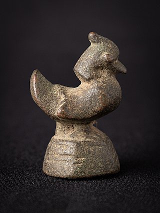 Antique Burmese bronze opium weight, animal figure in side view with curled tail