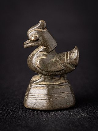 Burmese bronze opium weight with bird figure on square base, left side view
