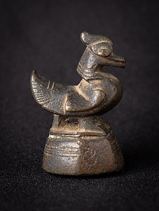 Antique bronze opium weight from Burma, animal-shaped, right side view