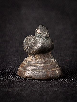 Bronze opium weight from Burma (Myanmar), 18th century, three-quarter view with visible patina