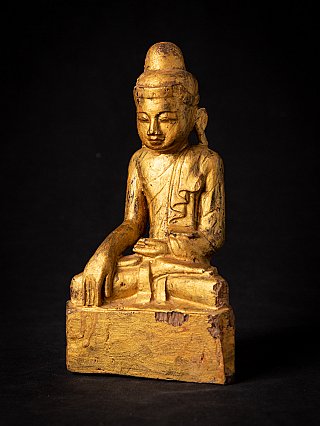 Buddha statue in gilded wood from Burma (Myanmar), seated, three-quarter view