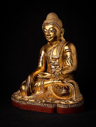 Mandalay Buddha statue from Burma (Myanmar) in wood, seated, three-quarter view