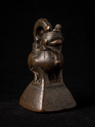 Antique bronze opium weight, Burma (Myanmar), 18th century, three-quarter view highlighting head and base