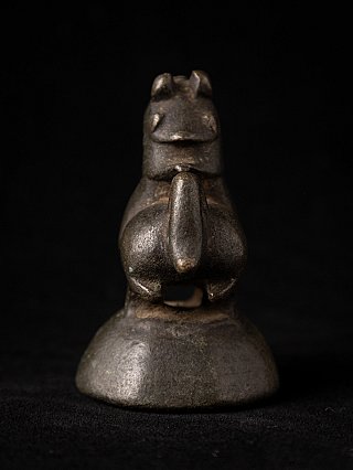 Antique bronze opium weight from Burma (Myanmar), rear view with raised tail
