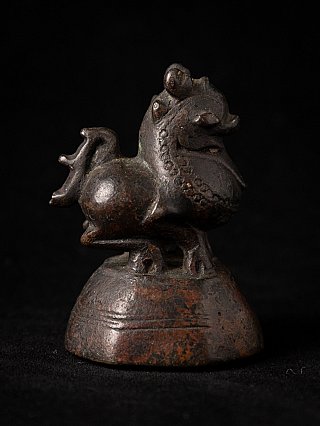 Burmese bronze opium weight G-171 with animal figure, left side profile