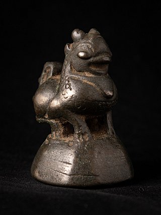 Burmese bronze opium weight, animal figure on base in three-quarter front right view