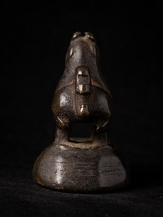 Antique bronze opium weight, rear view showing tail and base