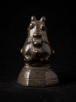 Burmese bronze opium weight, front view with wide mouth and two horn-like projections