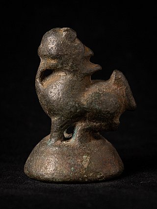 Antique Burmese bronze opium weight, 18th century, side view of the animal form on domed base